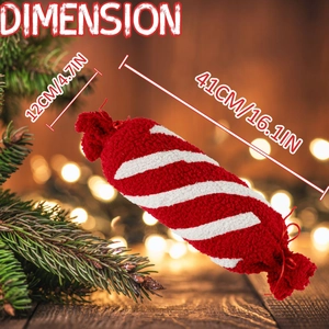 Detailansicht der Abmessungen des bonbonförmigen Weihnachtskissens mit Plüschtextur