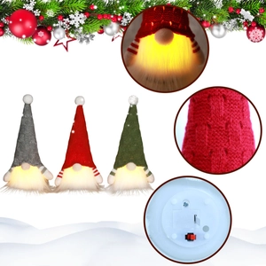 Detail showing lighted Christmas gnomes with knit hats and bottom battery compartment