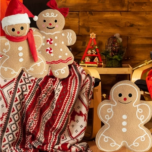 Gingerbread man plush pillow with Christmas hat and bow tie for festive home decor