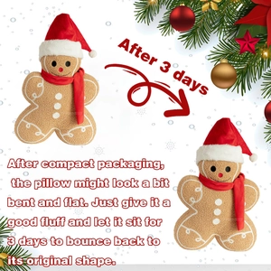 Detail of Christmas gingerbread man plush with red hat and textured brown fabric