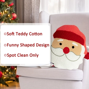 Detail of Santa Claus shaped pillow in soft teddy cotton fabric for Christmas decor