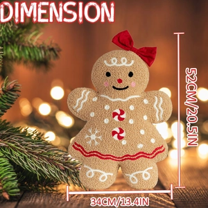 Detail shot of the 52cm gingerbread man plush toy with festive bow and soft texture