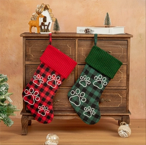 Classic Buffalo Plaid Christmas stockings with paw prints for holiday pet decor
