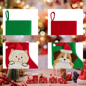 Detailed view of red and green pet Christmas stockings with cute cat and dog appliques