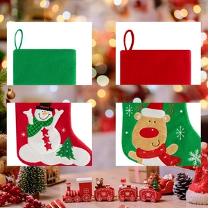 Detail of red and green Christmas pet socks showing reindeer and snowman embroidery art