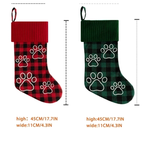 Set of 2 plaid pet Christmas stockings in red and green with white paw print embroidery