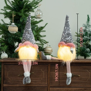 Lighted Christmas gnome with grey sequin hat and long legs for holiday decoration