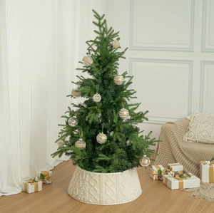 Close-up of cream knit Christmas tree collar with elegant diamond pattern weaving