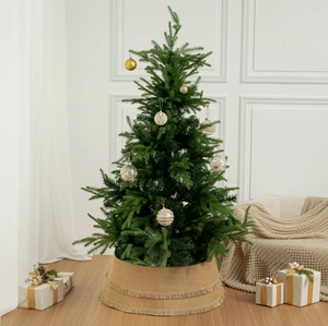 Close-up of burlap Christmas tree collar featuring natural double-layer fringe details