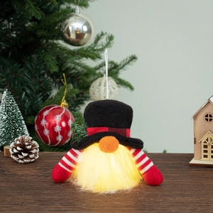 Hanging glowing Christmas gnome with black velvet hat and warm LED lights decor