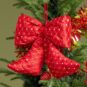 Large red velvet Christmas tree bow with gold lattice stitching and sequins
