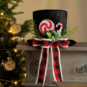 Black velvet Christmas tree topper hat with red candy canes and buffalo plaid bow