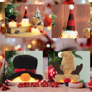 Close-up of LED glowing Christmas gnomes with plaid hats and antlers in a warm festive setting