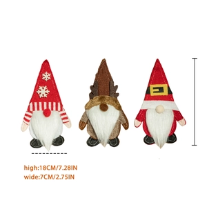Three Christmas gnome cutlery holders with reindeer and snowflake designs, 18cm tall