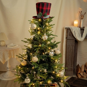 Classic red and black plaid top hat tree topper with pine needles and red berries