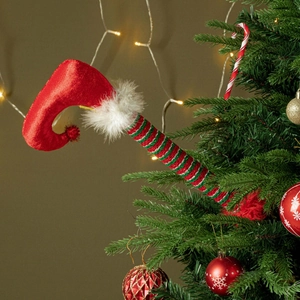 Christmas elf legs tree topper with red velvet fabric and green striped stockings