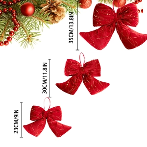 Set di tre fiocchi natalizi in velluto rosso con pois dorati di varie dimensioni