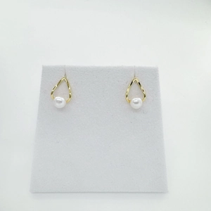 Minimalist gold geometric teardrop earrings with white pearl drop on white display card