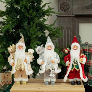 Three 12-inch standing Santa Claus figurines in gold, silver, and red festive outfits