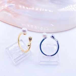Minimalist adjustable open ring featuring white pearl and cat design in gold and silver