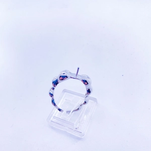 Close-up of silver beaded adjustable ring setting with a vertical peg for pearl inlay