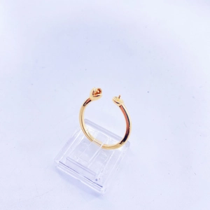 Macro detail of adjustable gold plated ring base with peg setting for pearl mounting