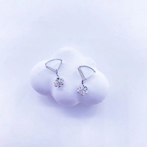 Elegant gold plated silver drop earrings with shell fan and flower pendant on white clouds