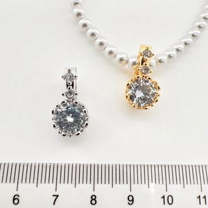 Luxury round cubic zirconia pendant necklaces with diamond accents in gold and silver plating