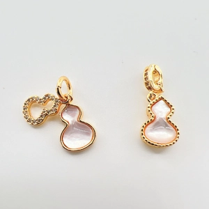 18k gold plated gourd pendant with mother of pearl inlay and elegant diamond accents