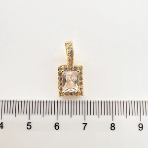 Detailed view of emerald-cut zircon gold pendant with size measurement reference