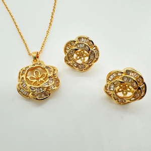 Golden 925 silver camellia jewelry set with necklace and earrings featuring micro-pave shell