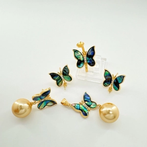 Golden butterfly jewelry set with natural shell inlay and pearls, five-piece collection