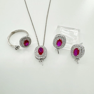 Elegant 925 silver jewelry set with oval red gemstones and sparkling zircon accents