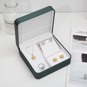 Elegant 925 silver jewelry set with yellow pearls and crystals in a green gift box