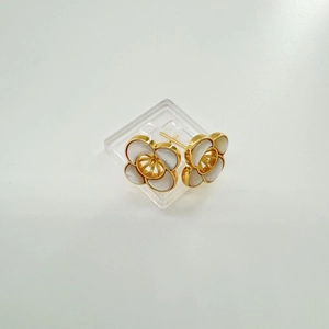 Detail of gold-plated four-leaf clover earring mounts for DIY pearl jewelry making
