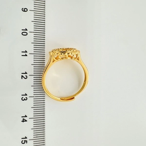 Detailed top-down view of a gold-plated flower ring setting with ruler showing 12mm diameter
