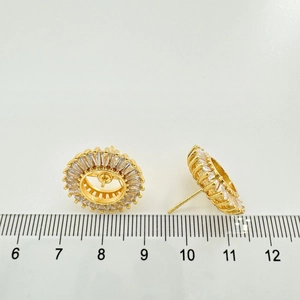 Macro view of S925 silver sunflower earrings with sparkling zircon measuring 20mm in diameter
