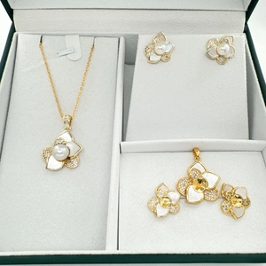 Floral jewelry set with gold-plated flower necklace and earrings featuring zircon accents