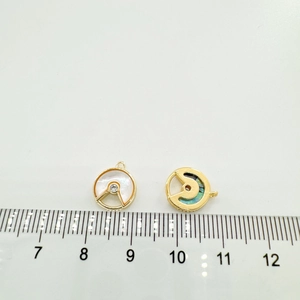 Detail of 18K gold butterfly shell pendant with size scale for DIY jewelry making