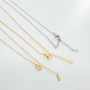 Chaîne à maillons O réglable en argent et or avec fermoir mousqueton et extension de chaîne