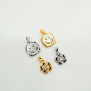 18K gold plated clover flower and smiley shell charms with zircon inlay details