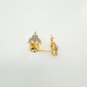 Detail of 18K gold-plated crown earrings with cubic zirconia and pearl base