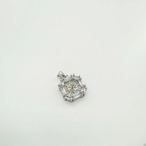 Detailed macro view of S925 silver square pendant with zircon inlay and floral cutout