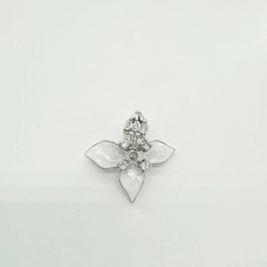 Elegant 18K gold-plated floral pendant with white enamel petals and cubic zirconia stones