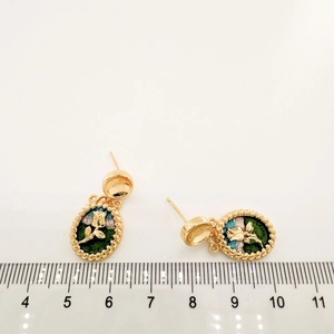 18K gold-plated vintage tulip enamel earrings with pearl accents on a clean white background