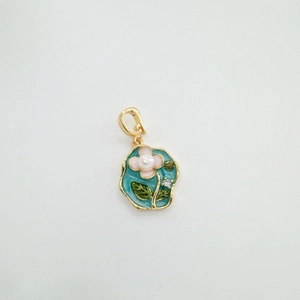 Detailed enamel flower pendant with pink petals, white pearl and gold lobster clasp