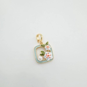 Detail of square enamel flower pendant with fresh water pearl for DIY jewelry