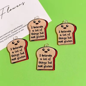 Acrylic cartoon toast bread charms with smile faces and gluten-free quotes on green base
