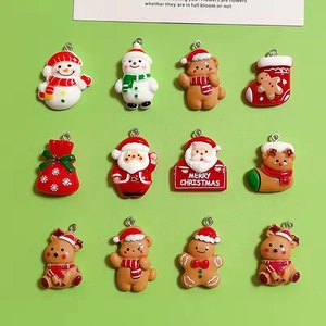 Set di 12 ciondoli natalizi in resina con Babbo Natale, pupazzo di neve e renne