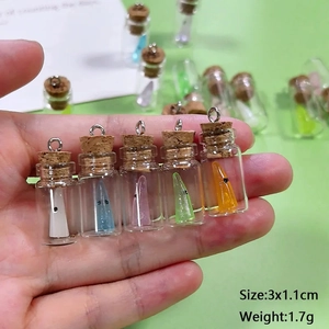 Luminous ghost resin pendants in glass bottles with corks for DIY jewelry making